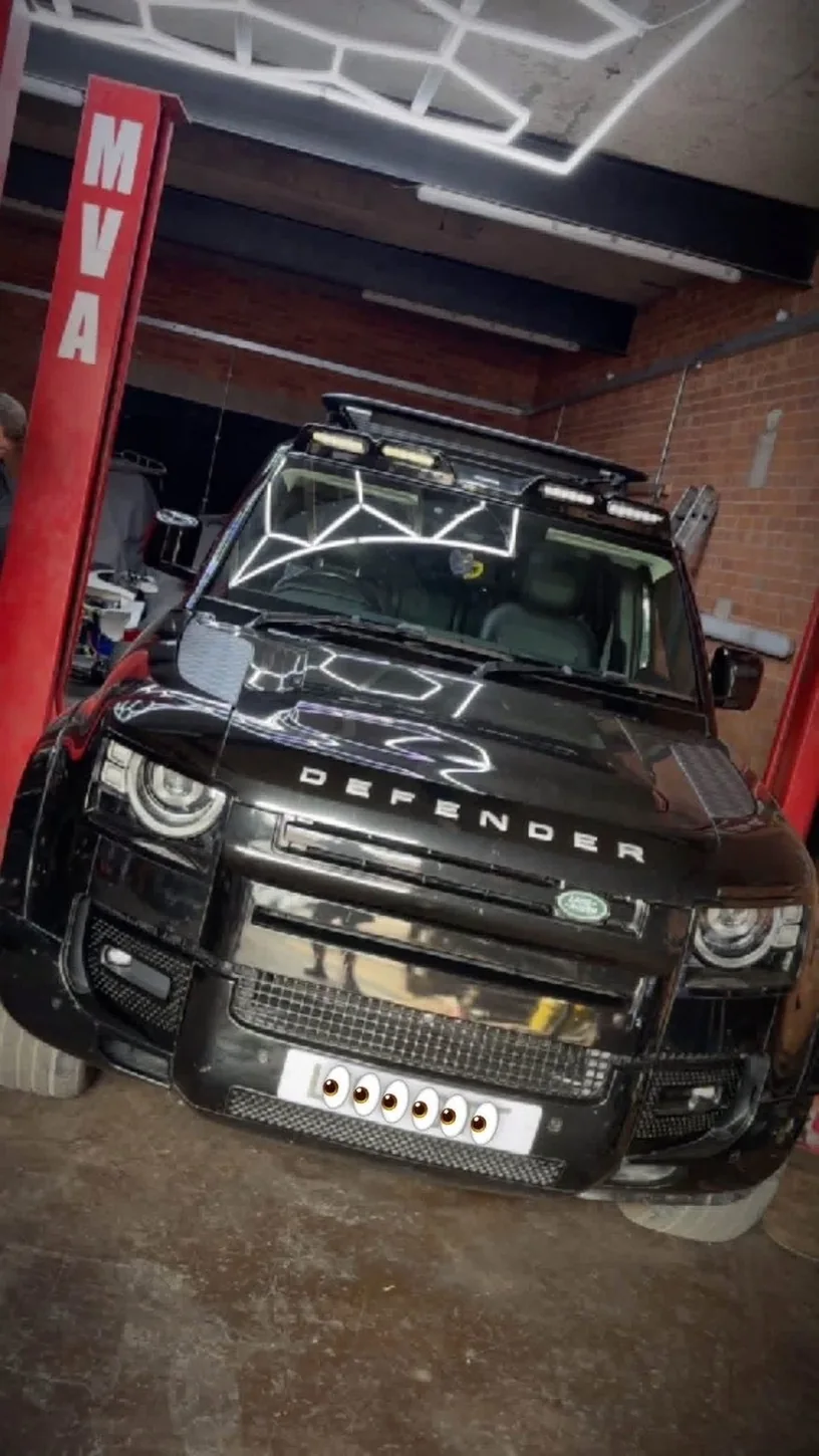 Black Land Rover Defender inside the MVA workshop